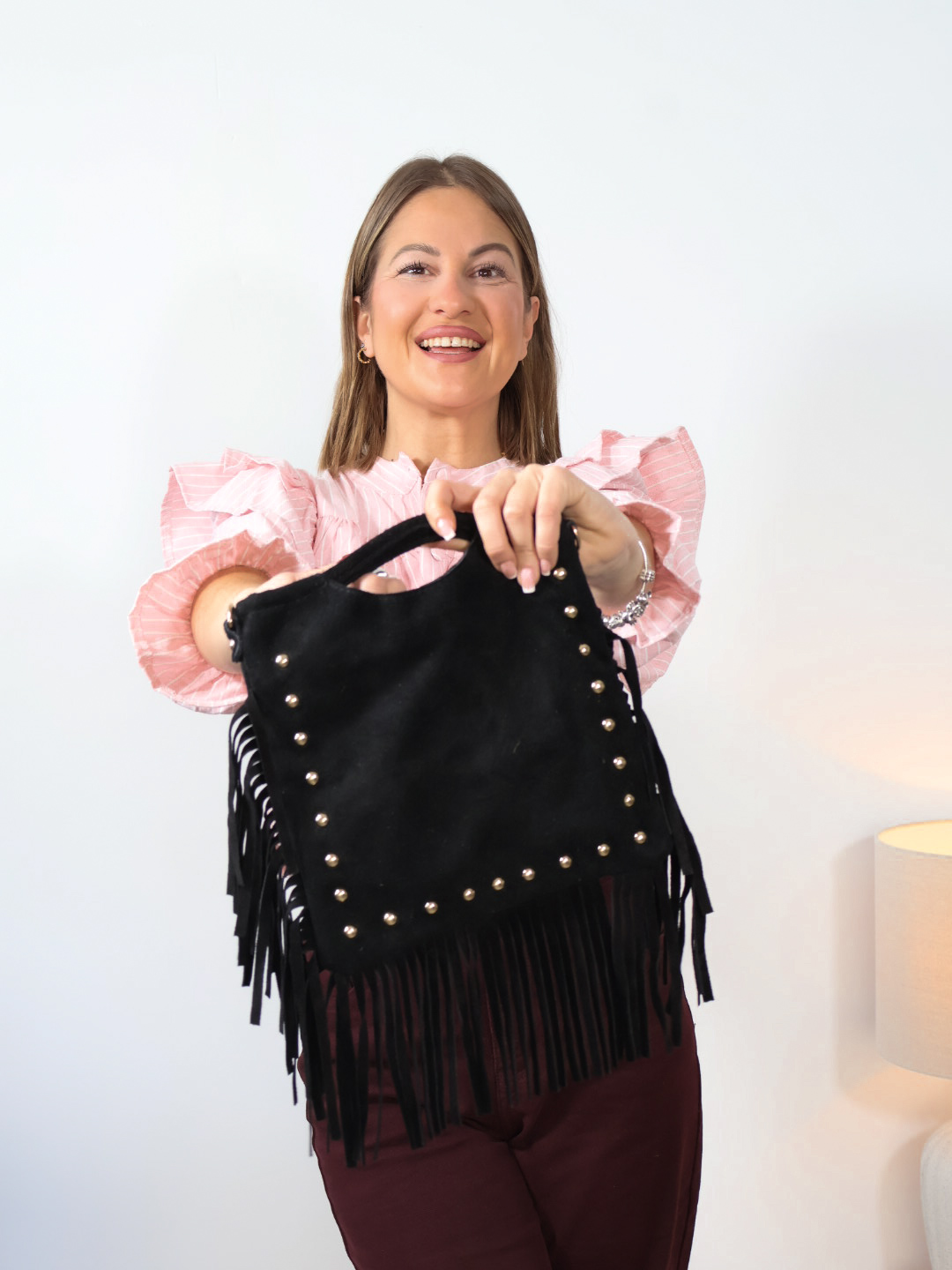 Bolso antelina negro flecado combinado